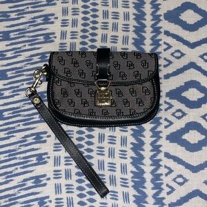 AUTHENTIC Dooney & Bourke 1975 wristlet 
- used